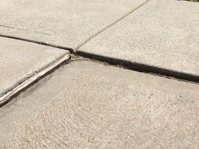 Uneven section of concrete driveway